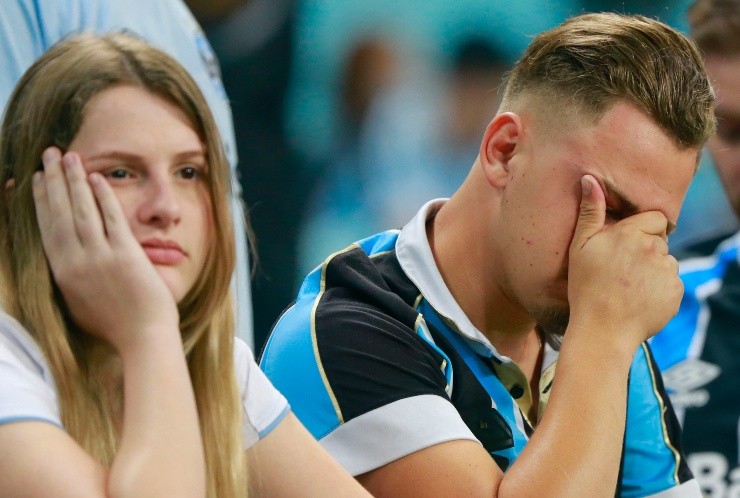 Silvio Avila/Getty Images - Torcedores do Grêmio, após a última rodada do Brasileirão 2021
