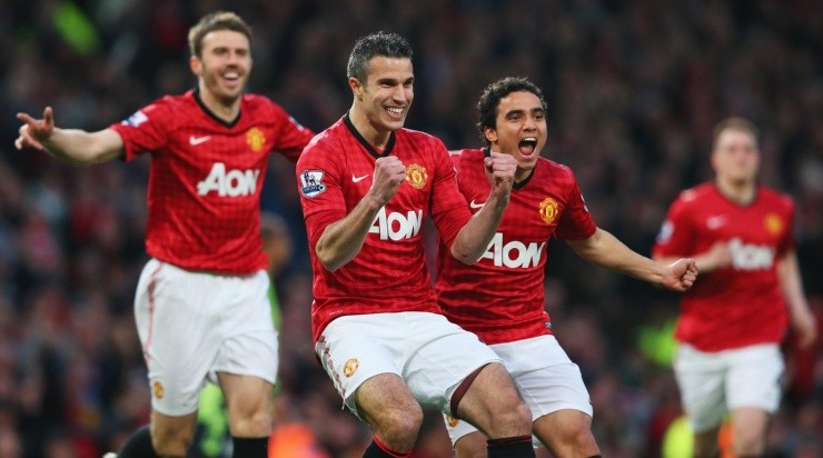 Foto: Alex Livesey/Getty Images - Rafael comemorando com Van Persie em 2013. Foto: Alex Livesey/Getty Images - Rafael comemorando com Van Persie em 2013.