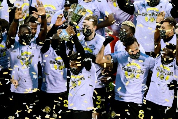 Emilee Chinn/Getty Images - The Columbus Crew festejando o título da conferência leste.