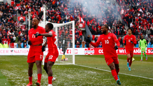 GettyImages/ Seleção do Canadá comemorando gol. 