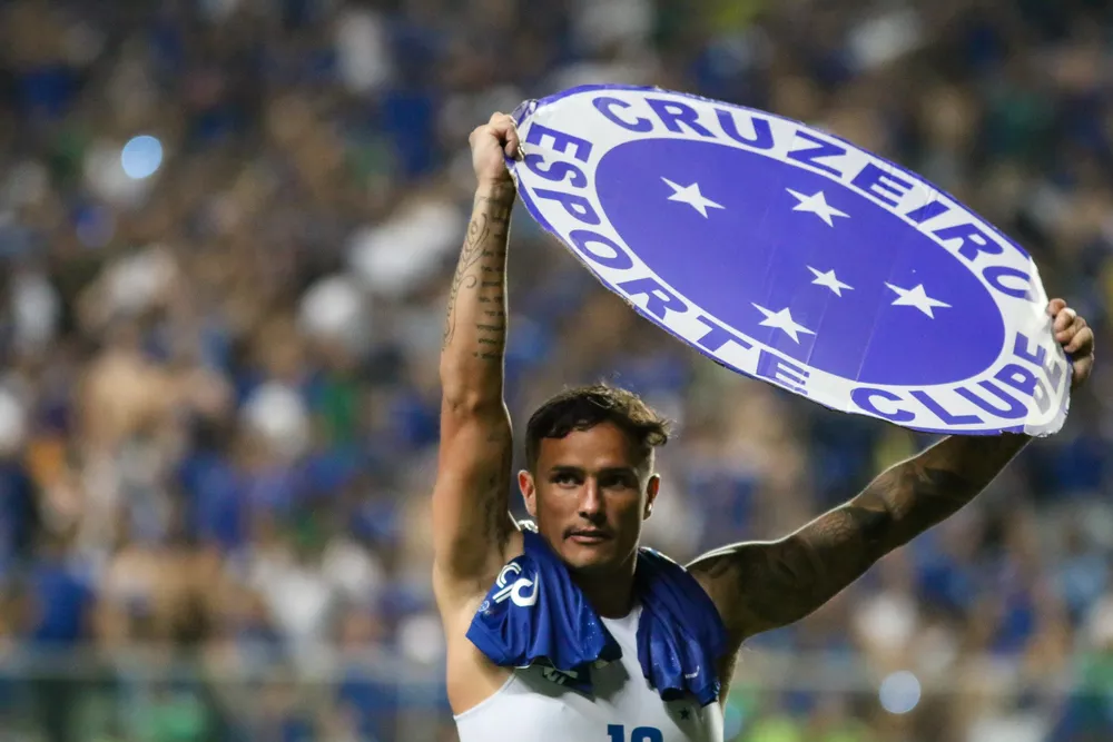  Fernando Moreno/AGIF/ Edu comemorando gol pelo Cruzeiro. 