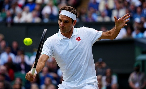 Federer em seu último jogo oficial, em Wimbledon.     Créditos: Mike Hewitt/Getty Images