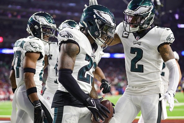 Eagles comemorando um touchdown contra o Texans.     Créditos: Carmen Mandato/Getty Images