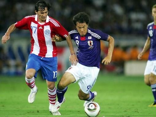 Koji Watanabe/Getty Images – Japão e Paraguai se enfrentando nas oitavas de final na Copa do Mundo da Africa so Sul em 2010