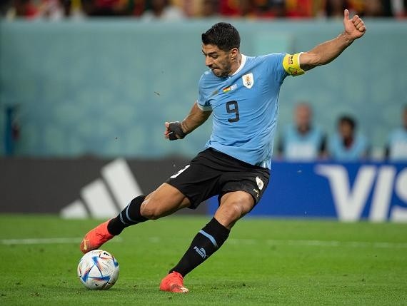 Visionhaus/Getty Images – Luis Suarez jogando a Copa do Mundo pelo Uruguai